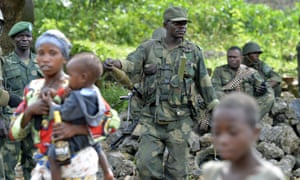 FARDC governmental troops patrol in the city of Bunagana, near the border with Uganda. Democratic Republic of Congo troops are aiming to rout the remaining pockets of the M23 rebel movement, after seizing their last stronghold in a push to finally break the back of the insurgency.