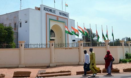 Flags fly at half mast in Niamey, the capital of Niger, in memory of 92 who died in Sahara