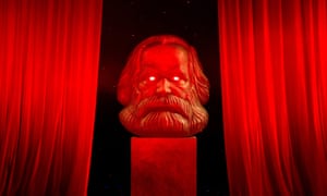 Karm Marx bust lit in red