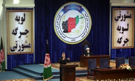Afghan president Hamid Karzai speaks on the first day of a four-day loya jirga in Kabul.