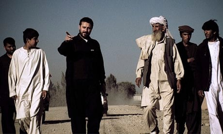 Jeremy Scahill (centre, in black) in a scene from Dirty Wars