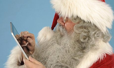 Father Christmas with a tablet