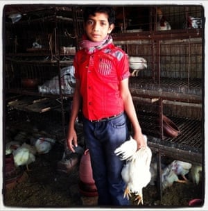Guardian photographer David Levene is currently on assignment in Dhaka, Bangladesh, where he took this instagram portrait of a boy selling chickens.