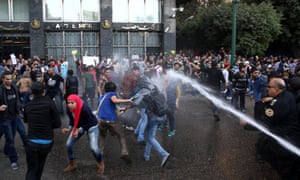Egyptian police fire water cannons to disperse a protest in Cairo.