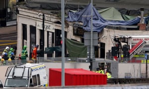 Emergency services at the Clutha Vaults pub in Glasgow where a police helicopter crashed on Friday night
