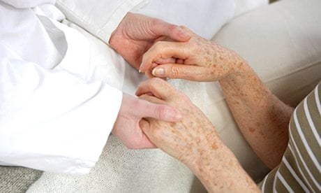 Palliative care: a therapist holds a client's hands