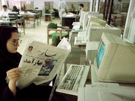 A journalist reads the first daily issue of the reformist newspaper Bahar (Spring) at the offices of Hamshahri, another pro-reform newspaper, 8 May 2000. 