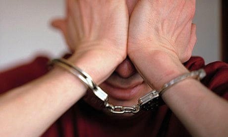 Man Stressing in Handcuffs