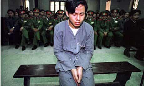 A Vietnamese teenager faces a firing squad