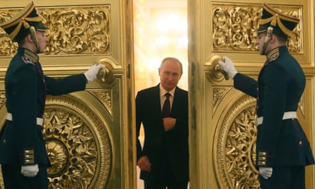 President Vladimir Putin enters the St. George's Hall of the Grand Kremlin Palace for his annual address to the Federal Assembly in Moscow, Russia.