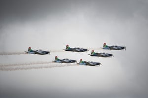 Qunu awaits: The South African airforce flies in formation