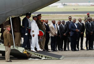 Mandela: Mandela's flag-draped coffin arrives at the Mthata airport