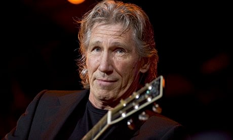 Roger Waters performs on stage 