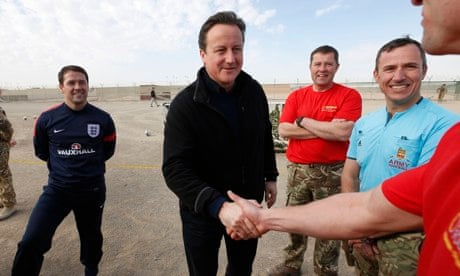 David Cameron and Michael Owen meet troops