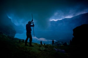 A sulphur miner performs an annual ritual to ward off potential disasters on the Ijen volcano in Yogyakarta, Indonesia.