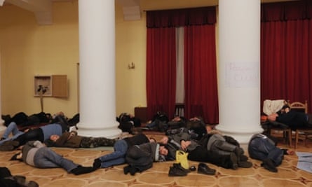 Protesters occupy the Kiev City Council after violent protests overnight.