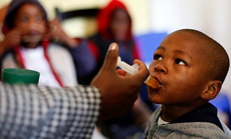 A boy receives medication at Nkosi's Haven, south of Johannesburg