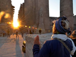 Weekend in pictures: Luxor, Egypt: A tourist makes a dawn visit to the temple of Karnak on the d