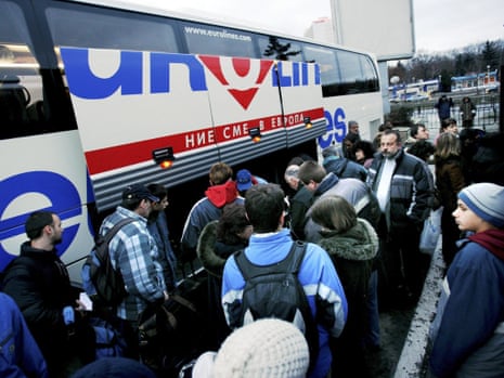 Bulgarians wait to board coaches departing Sofia Central Bus Station destined for Berlin on January 3, 2006 in Sofia, Bulgaria.
