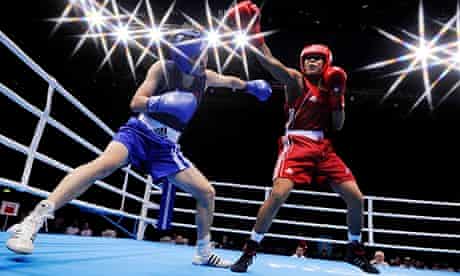 Two women boxing at a women's boxing test event