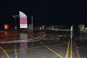 Weather UK: Cleethorpes Beach sign sees water underneath it as the River Humber surges 