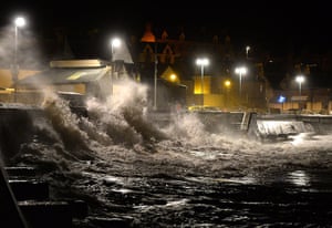 UK weather update: A tidal storm surge pounds Eyemouth Harbor