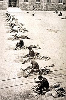 Line of prisoners including Nelson Mandela at Robben Island prison in the mid-1960s