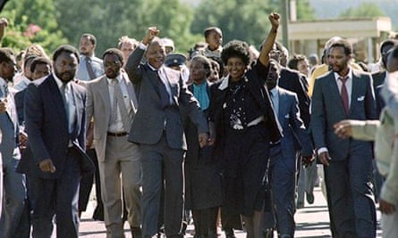 Nelson and Winnie Mandela acknowledge the crowds cheering his release on 11 February 1990