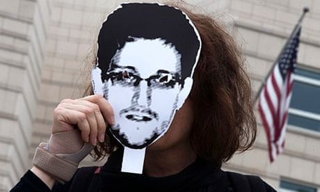Woman holds Edward Snowden portrait outside US embassy, Berlin 4/7/13
