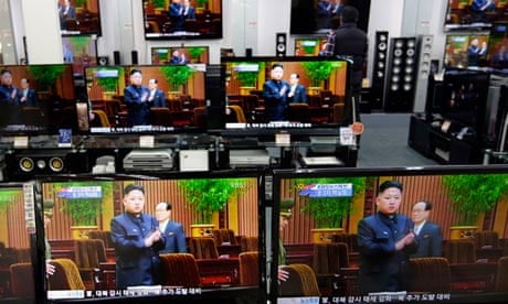 A South Korean man watches a TV screen showing the North Korean leader, Kim Jong-un