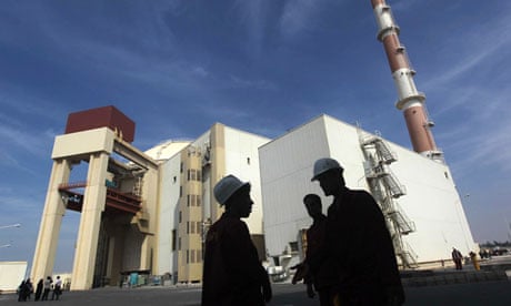 Iranian workers in front of the Bushehr nuclear power plant