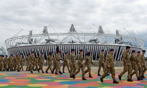 Members of the Armed Forces are shown around the site of the London 2012 Olympics in east London on July 15, 2012.