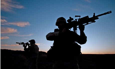 US Navy SEALs during desert combat training.