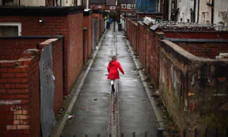 Child runs down alleyway