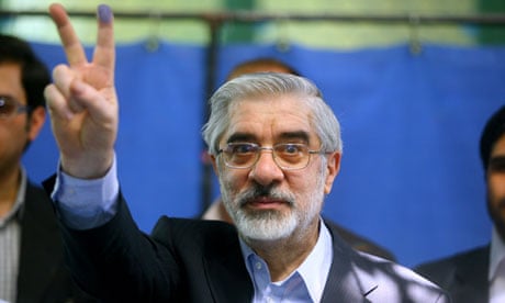 Iranian opposition leader Mir Hossein Mousavi flashes the V sign after voting in the 2009 elections