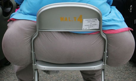 obese-person-sits-on-a-ch-008.jpg