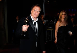 Oscars after party: Quentin Tarantino holds his Oscar at the Governors Ball