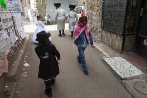 Children wear costumes for the Jewish holiday of Purim in Jerusalem's Mea Shearim neighbourhood.