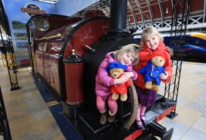 Three-year-old Alexandra Brimmer (left) and five-year-old Imogen Brimmer pose on the Princess, the world's first narrow gauge steam engine, which has been restored by the craftsmen at Ffestiniog Railway in North Wales, and has gone on display at London's Paddington Station for six weeks to commemorate the 150th anniversary of narrow gauge steam and to celebrate St David's Day. Photograph: Matt Alexander/PA
