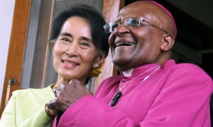 South African Archbishop Desmond Tutu and Burma opposition leader Aung San Suu Kyi after the Nobel laureates' met at her residence in Rangoon.