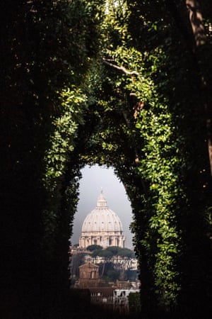 The dome of St. Peter's Basilica is seen from the Aventino in Rome, Italy.  The Pope will hold his last weekly public audience tomorrow before he retires the following day.