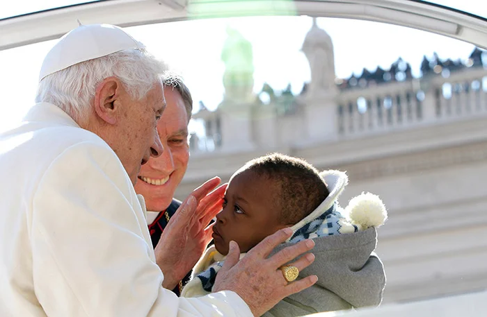 https://i.guim.co.uk/img/static/sys-images/Guardian/Pix/pictures/2013/2/27/1361976508689/Pope-Benedict-XVI-Holds-H-017.jpg?w=700&q=55&auto=format&usm=12&fit=max&s=a15eebaa1f2e231c3f37c8d65cb18713