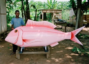 Coffins in Ghana: A coffin being made in the shape of a fish near Accra