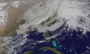 A satellite image from the National Oceanic and Atmospheric Administration shows a western frontal system approaching a coastal low pressure area.