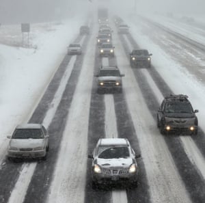Cars head toward the New Hampshire border on Route 93 prior to a mandatory Massachusetts statewide driving ban.