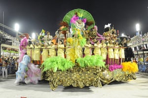 Carnival: A float loaded with people makes its way through the parade