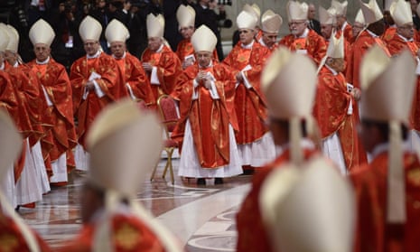 Cardinals attend mass in St Peter's Basilica on 12 March 2013.