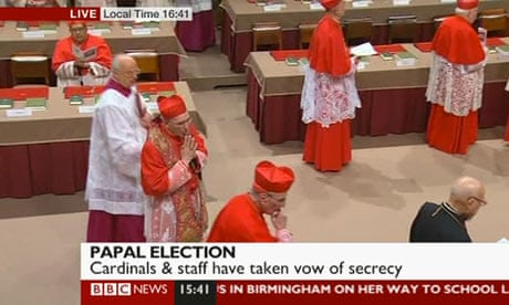 Cardinals walk into the Sistine Chapel to elect a new pope on 12 March 2013.