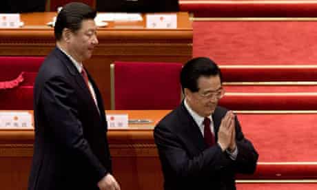 China's new president, Xi Jinping, left, is applauded by his predecessor, Hu Jintao.