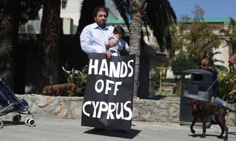 Cypriots protest outside parliament